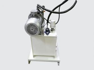 Hydraulic power unit for compression and traction machines